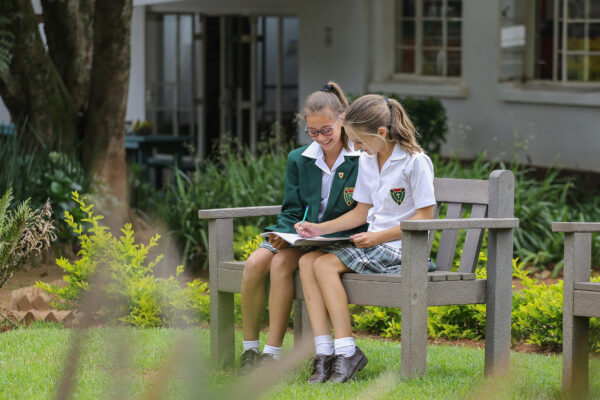 Uplands-girls-on-bench-learning